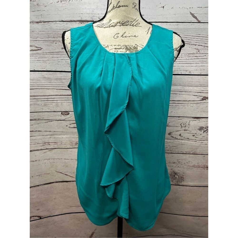 Covington medium teal sleeveless blouse with fun embellishment in front -‎ 3140